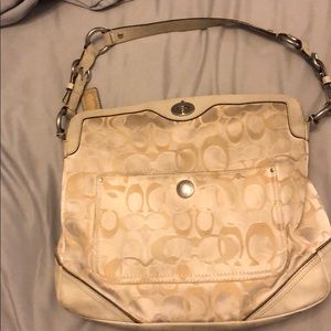 White and beige coach bag